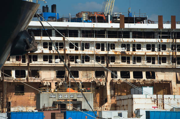Costa Concordia wreck in Genoa Harbor The dismantling and recycling of the infamous Costa Concordia cruise liner has been completed in Italy in Genoa Harbor during the demolition operation 2012 stock pictures, royalty-free photos & images