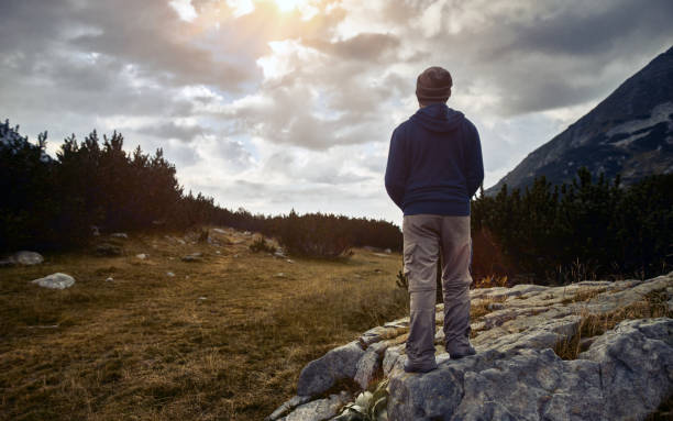 istock Traveling alone in the mountains at sunset 1095857146