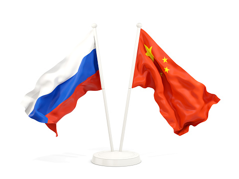 Two waving flags of Russia and China isolated on white. 3D illustration