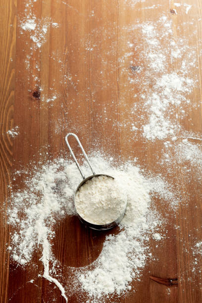 istock Flour,White flour, Woooden Floured Background 1095864974