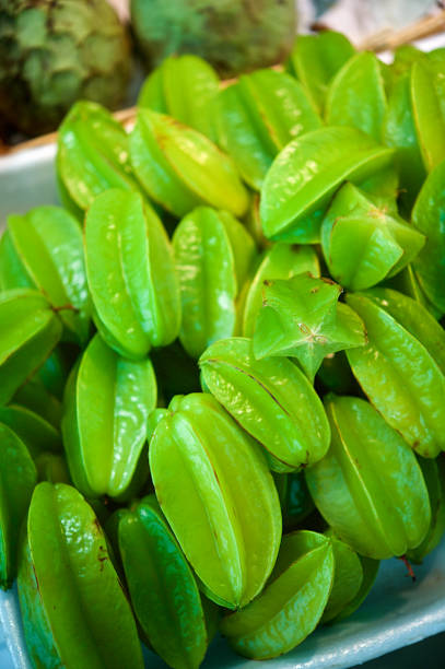 Uncut Organic Fresh Green starfruit together Valencia Spain