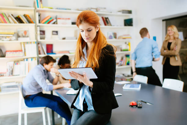 istock Businesswoman holding tablet in office 1095875368
