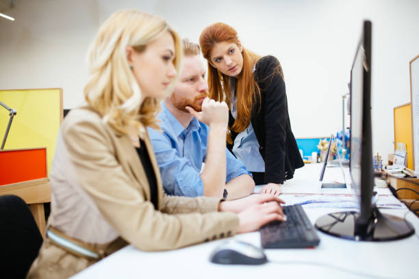 istock Business people collaborating in office and working on project together 1095875416