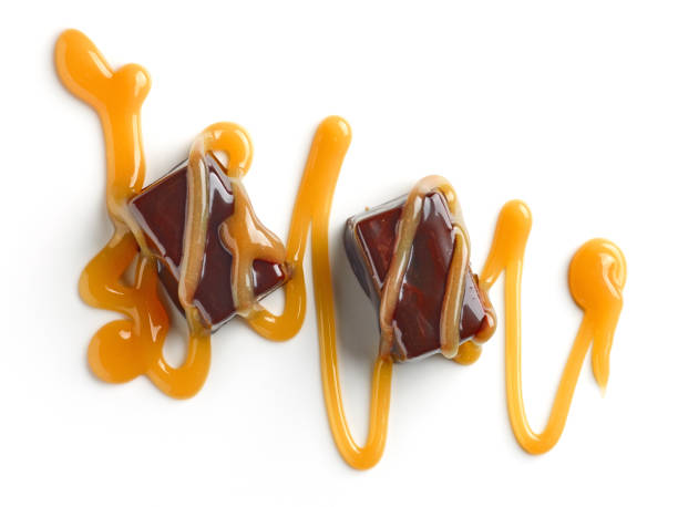 istock chocolate candies and caramel sauce 1095876236