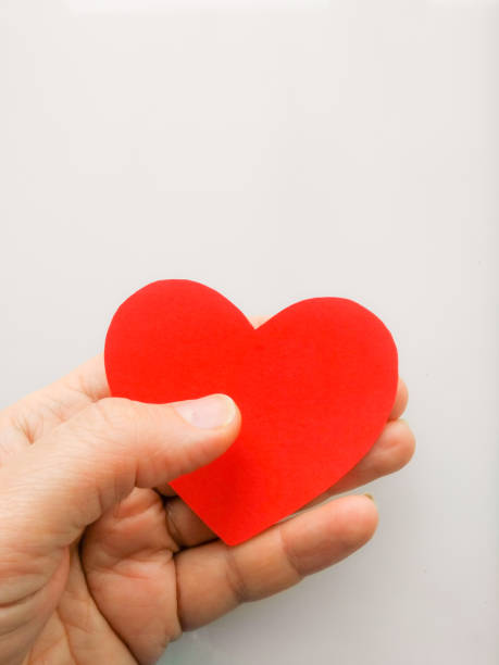 istock Red heart in hand 1095878316
