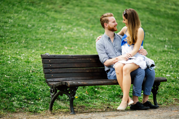 istock Beautiful couple taking a walk in city park 1095878824