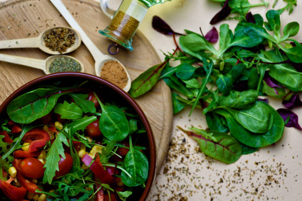 istock Fresh vegetable salad with corn, herbs and spices 1095880022