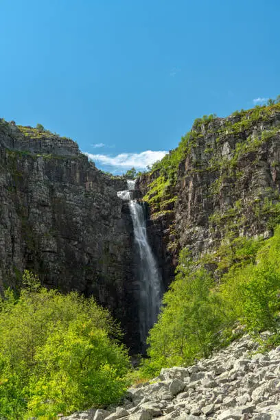 Photo of Summer view of the waterfall Njupeskar in  Sweden