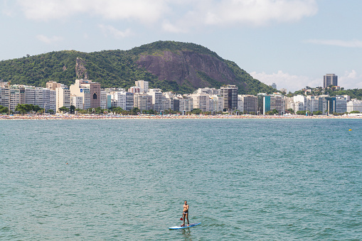 Brazil, Rio de Janeiro: January 5, 2019: People relaxing on Copacabana beach in Rio de Janeiro