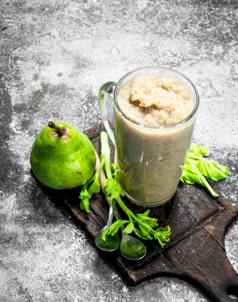 istock Smoothie with banana, pear and celery. 1095895568