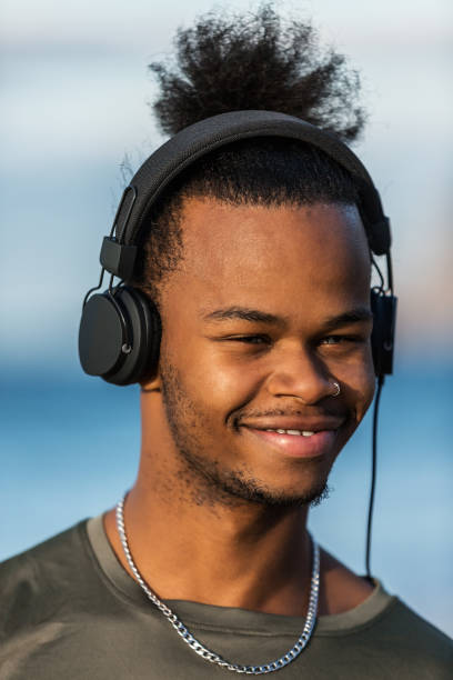 istock Smiling black guy in headphones 1095904842