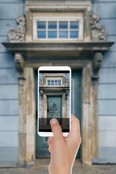 istock A man shooting old blue door in Riga 1095907728