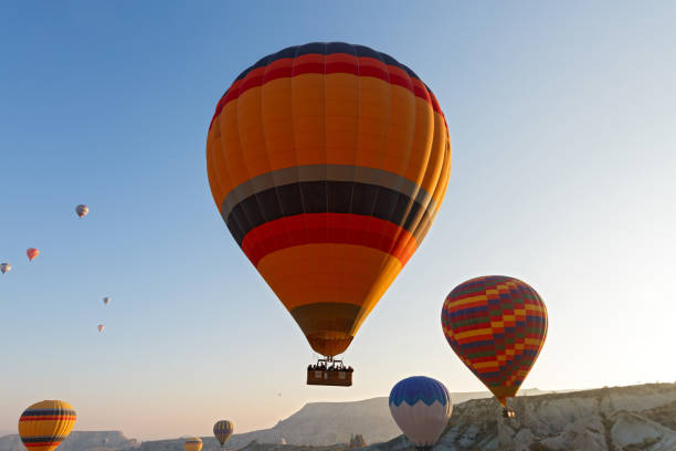 istock Air balloon flight over the mountains 1095912386