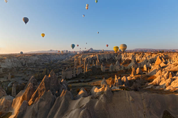 istock Hot air balloon flight over the mountains 1095912474