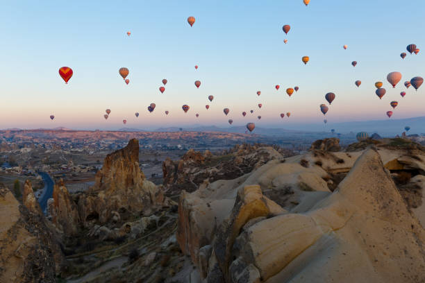 istock Hot air balloon flight over the mountains 1095912922