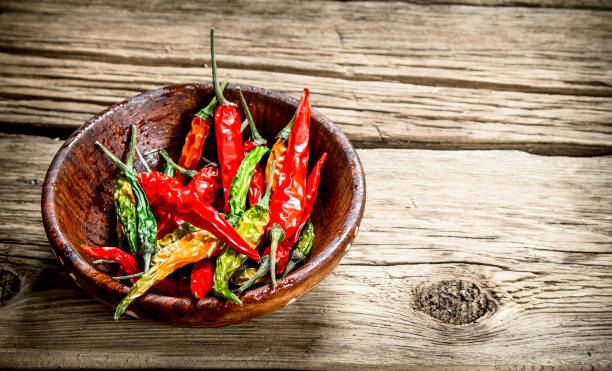 istock Hot chili peppers in the bowl . 1095914674