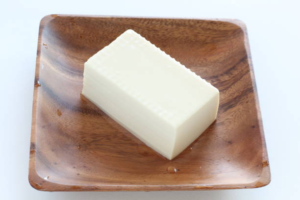 istock Tofu on wooden plate 1095924192