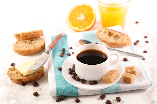 coffee cup with bread and butter