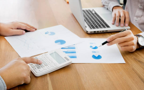 istock business executives negotiate meeting in modern office discussing a quality data 1095927922