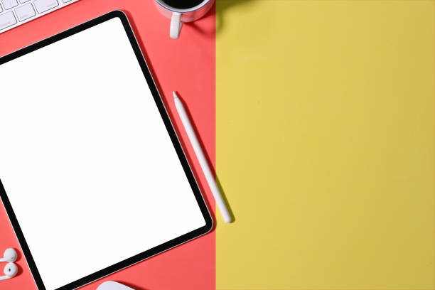 istock Office colourful desk working space and mockup tablet 1095928506