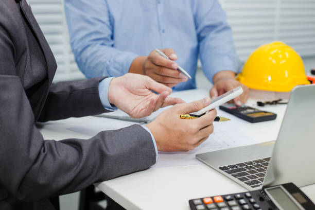 istock Architects and businessman analyze and plan projects together at the meeting. 1095932274