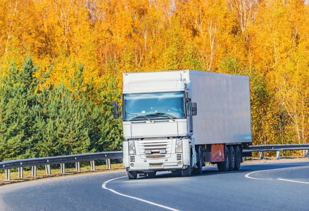 istock Freight truck moves on the road. 1095933398