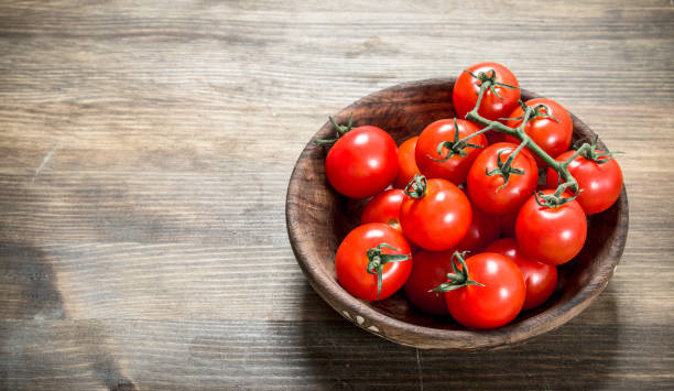 istock Ripe tomatoes in a bowl . 1095934880