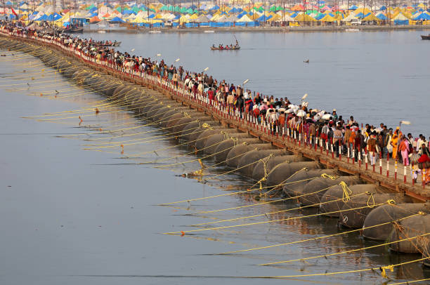 Kumbh Mela Festival February 02, 2013. Allahabad, India.
Kumb Mela Festival or Kumb Mela with its short name is a social festival organized in India every 12 years according to the traditions of Hinduism. It is considered the world's largest religious organization.
The Kumbh Mela festival, which is the world's largest religious meeting, bridges on the Ganges. prayagraj photos stock pictures, royalty-free photos & images