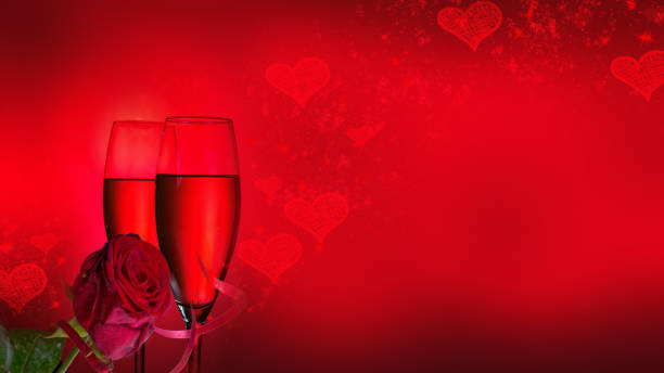 istock Valentines day background with champagne glasses and red roses 1095947114