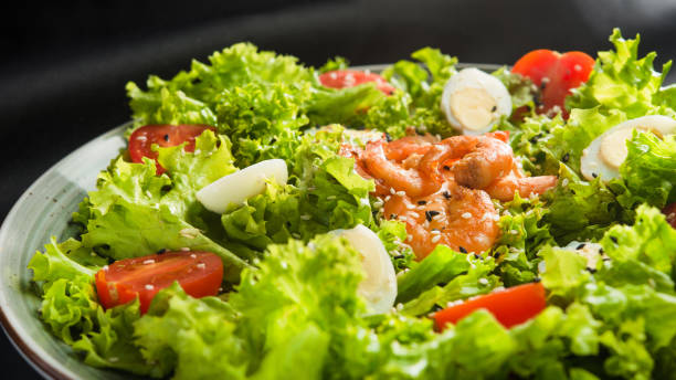 istock Fresh salad with shrimp, egg and mixed greens 1095950582