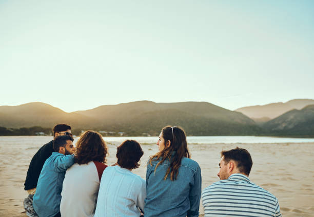 istock Just a bunch of friends on the beach 1095957632
