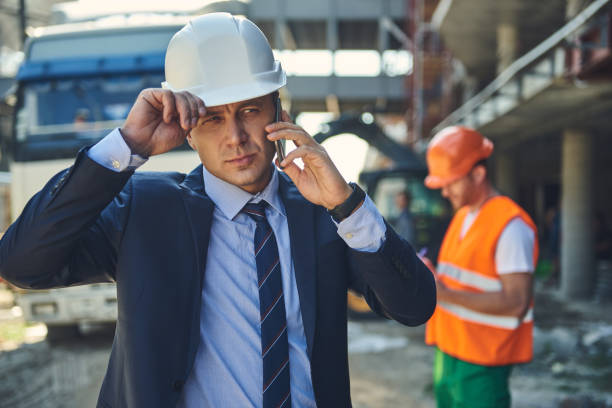 istock Boss with foreman are locating at construction site 1095964742
