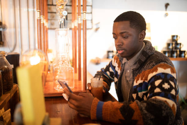 istock Millennial African American in a hip cafe 1095967192