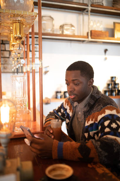 istock Millennial African American in a hip cafe 1095967208