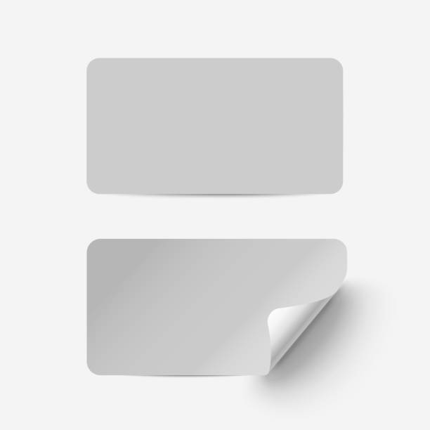 istock Vector grey realistic paper adhesive stickers with curved corner on transparent background. 1095972902