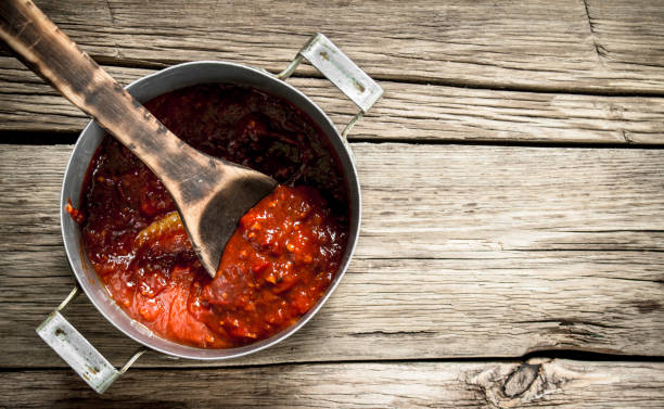 istock Tomato sauce in the pot. 1095973316