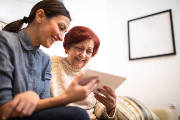 istock Modern grandma with granddaughter 1095974072
