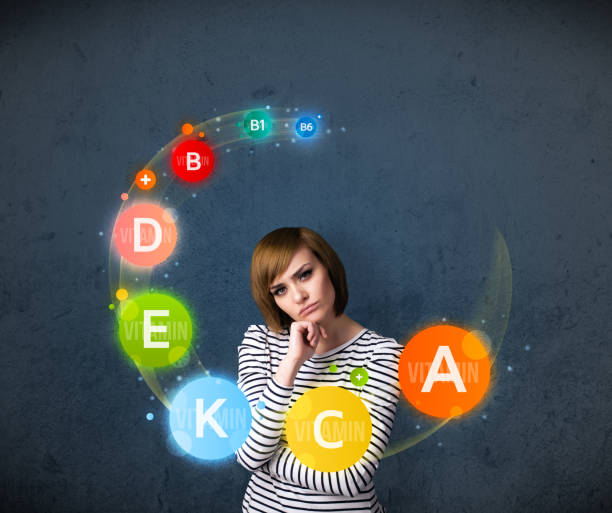 istock Young woman thinking with vitamins circulation around her head 1095975544