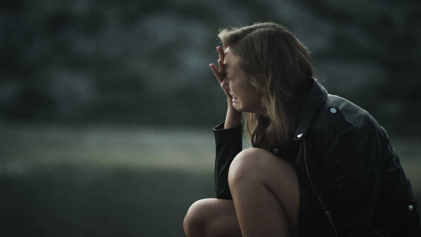 Photo of Crying Woman. Loneliness in the wild
