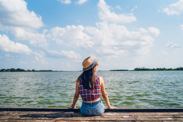 istock Sitting on the lakeshore 1095986278