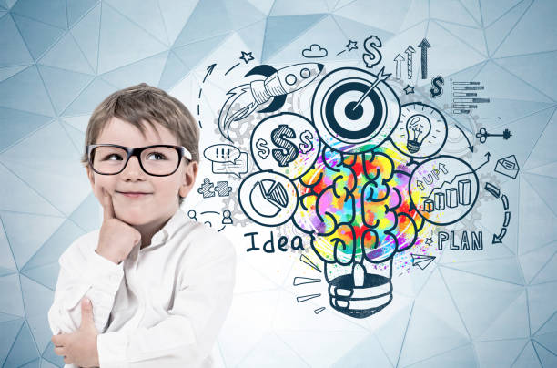istock Little boy in glasses, business idea 1095990148
