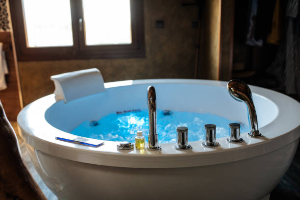 istock Modern beautiful hot tub with water 1095992526