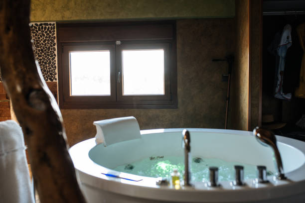istock Modern beautiful hot tub with water 1095992536