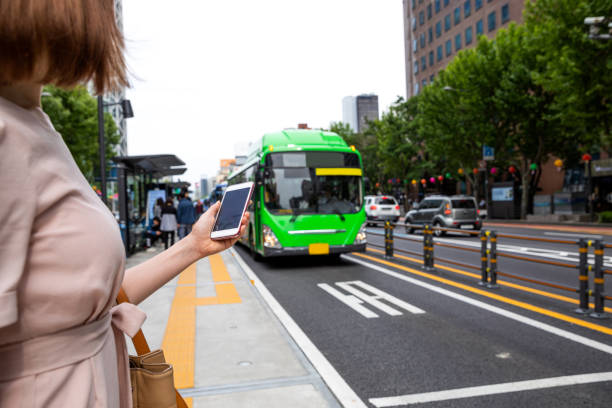Elegant Korean woman in the city of Seoul downtown Elegant Korean woman in the city of Seoul downtown seoul bus stock pictures, royalty-free photos & images