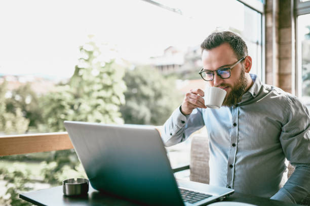 istock Handsome Businessman Enjoying Morning Coffee 1096005032