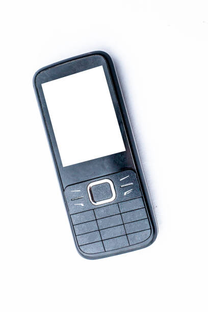 istock Black colored Mobile phone or cell phone or keypad cell phone or keypad mobile phone isolated on white. 1096005372