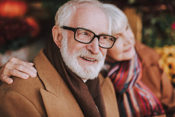 istock Senior bearded man in glasses spending time with wife 1096006040