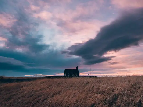 Búðakirkja set amongst a vibrant sky on the Snaefellsnes peninsula in Iceland