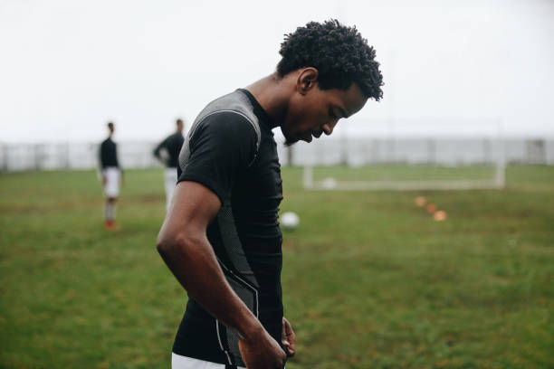 istock Close up of a soccer player standing on field 1096016674