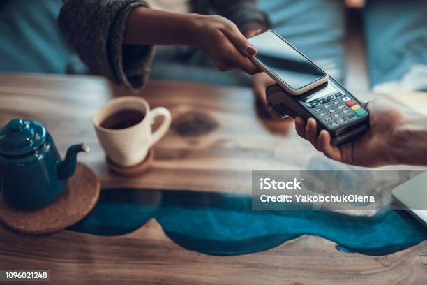 Horizontal Image Of Contactless Payment With Smartphone Stock Photo - Download Image Now